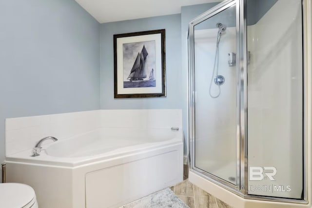 455 E Beach Blvd Unit 807, Gulf Shores, AL 36542 - full bathroom featuring a shower stall, a bath, and toilet