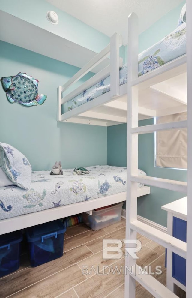 455 E Beach Blvd Unit 807, Gulf Shores, AL 36542 - bedroom featuring wood finished floors