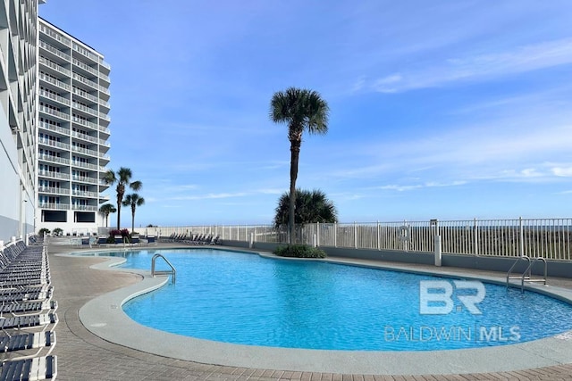 455 E Beach Blvd Unit 807, Gulf Shores, AL 36542 - community pool featuring fence