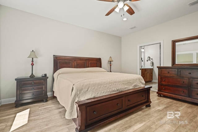 bedroom with ceiling fan, connected bathroom, light wood-style flooring, visible vents, and baseboards