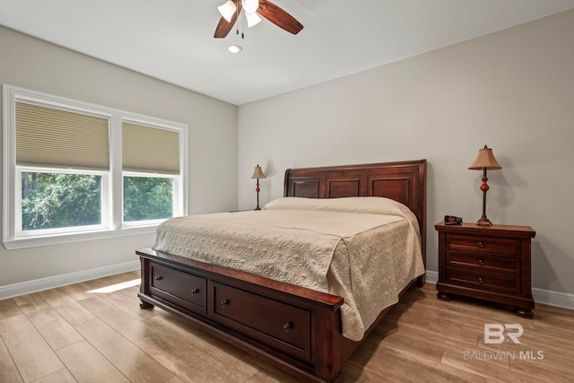 bedroom with light wood-style flooring, baseboards, a ceiling fan, and recessed lighting