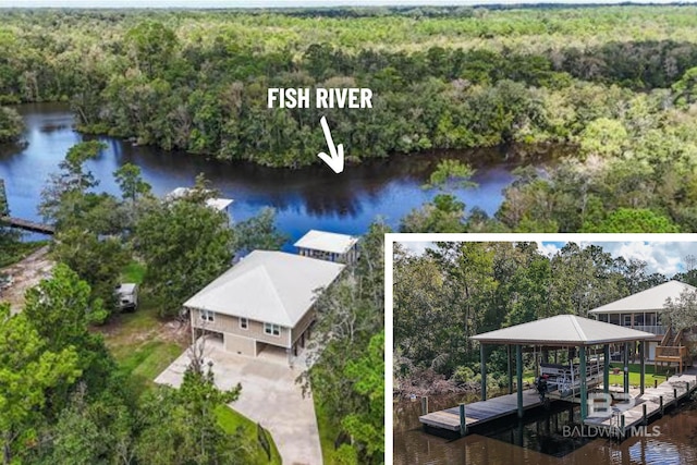 bird's eye view featuring a water view and a wooded view