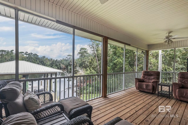 sunroom / solarium with ceiling fan