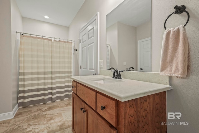 full bathroom with vanity and a shower with shower curtain