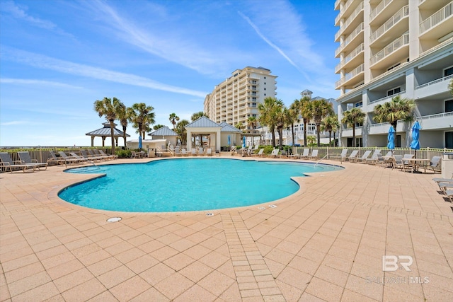 view of swimming pool featuring a gazebo and a patio area