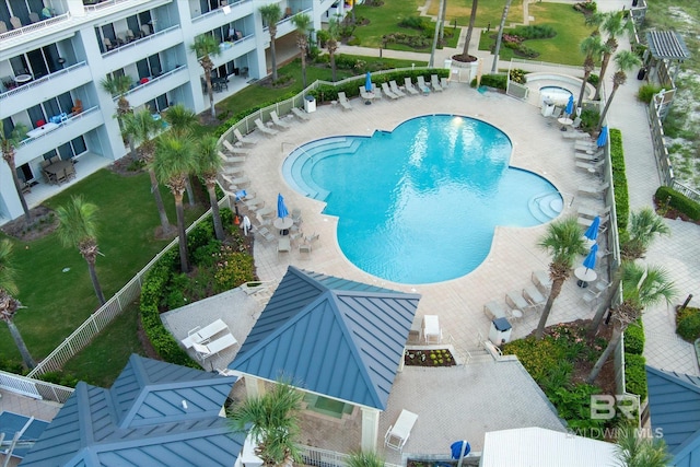 view of swimming pool featuring a patio area