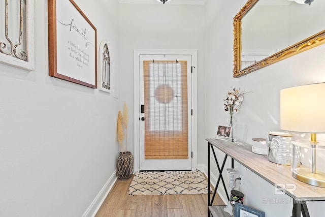 doorway with light hardwood / wood-style flooring