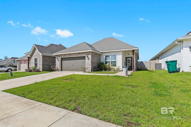 view of front of home featuring a garage, central AC, and a front yard