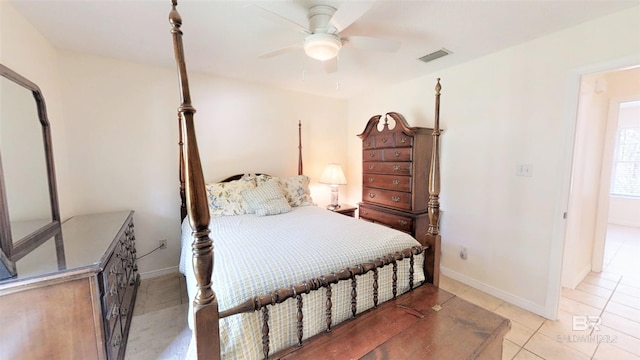 bedroom with light tile patterned floors and ceiling fan