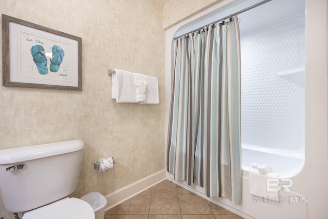 bathroom featuring tile patterned floors and toilet