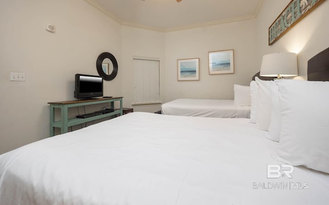 bedroom featuring ornamental molding