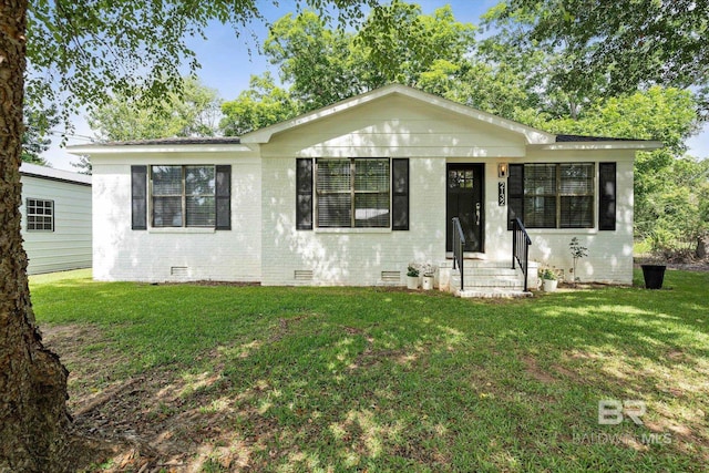 2132 S Pine St, Loxley, AL 36551 - bungalow-style house with crawl space, a front lawn, and brick siding