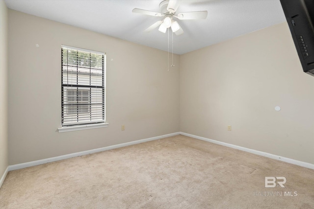 2132 S Pine St, Loxley, AL 36551 - empty room featuring carpet floors and ceiling fan