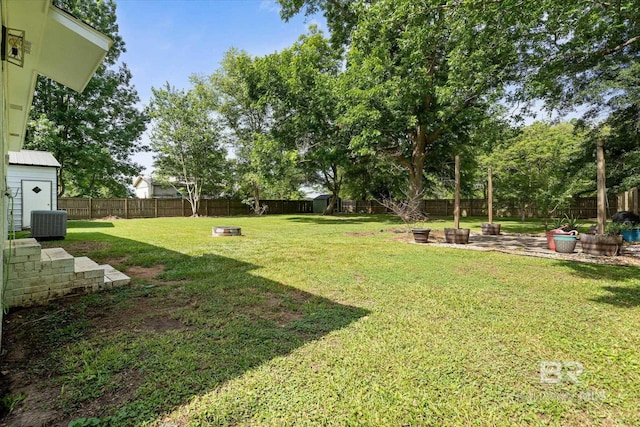 2132 S Pine St, Loxley, AL 36551 - fenced backyard featuring an outdoor fire pit and a patio area