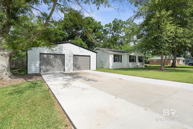 2132 S Pine St, Loxley, AL 36551 - ranch-style home with an outdoor structure and a garage