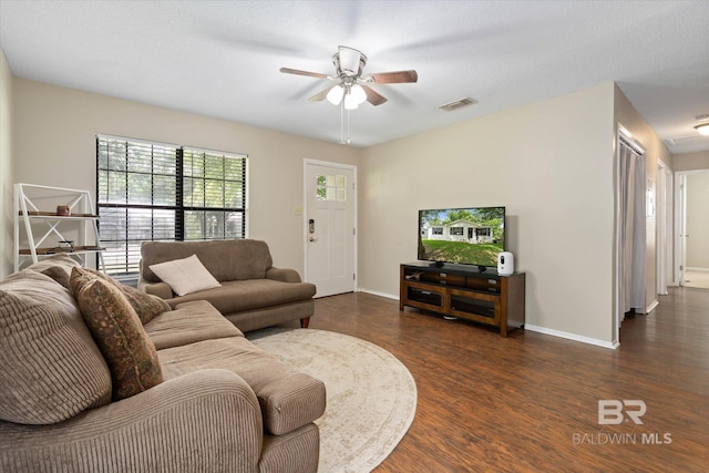 2132 S Pine St, Loxley, AL 36551 - living area featuring dark wood-style floors and a ceiling fan