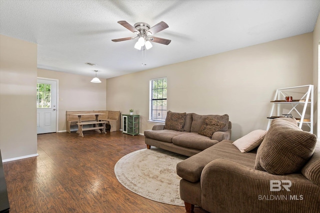 2132 S Pine St, Loxley, AL 36551 - living area with plenty of natural light, a ceiling fan, and wood finished floors