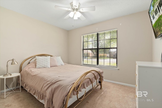 2132 S Pine St, Loxley, AL 36551 - bedroom featuring light carpet, multiple windows, and a ceiling fan