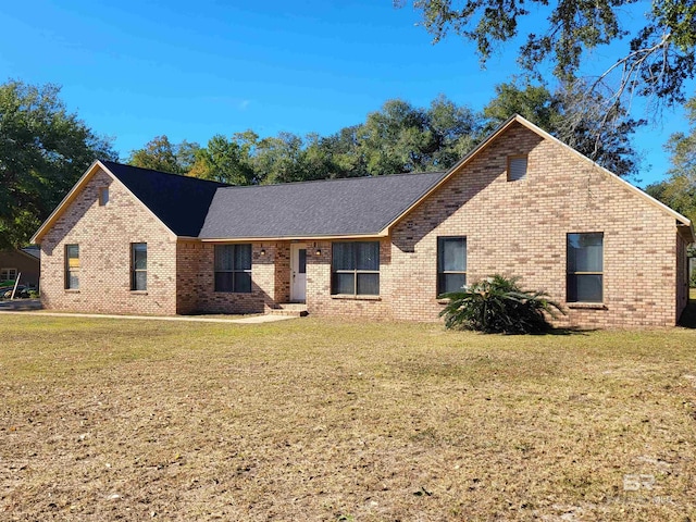 view of front of property with a front lawn