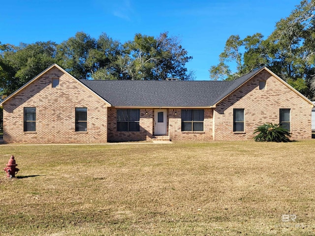 ranch-style home with a front yard