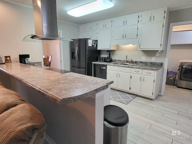 kitchen with white cabinetry, kitchen peninsula, island range hood, black appliances, and ornamental molding