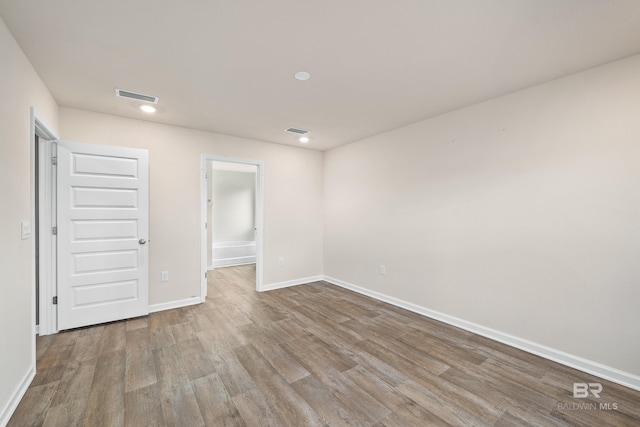 24193 Lanai Ln, Elberta, AL 36530 - unfurnished bedroom featuring wood finished floors and recessed lighting