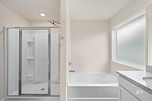 24193 Lanai Ln, Elberta, AL 36530 - bathroom with a shower stall, a garden tub, and vanity