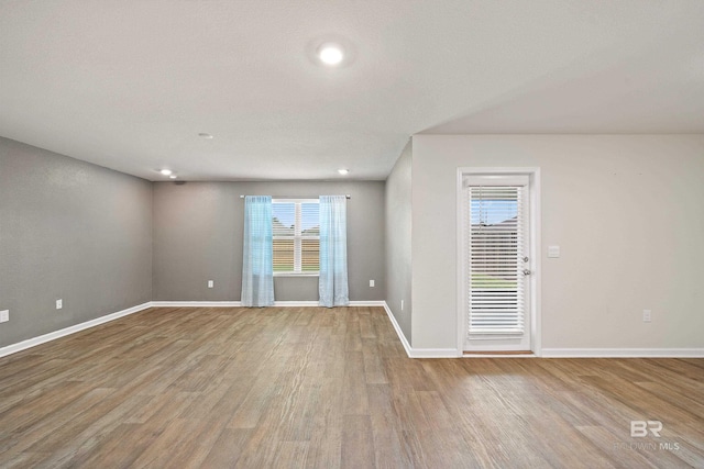 24193 Lanai Ln, Elberta, AL 36530 - spare room featuring healthy amount of natural light and wood finished floors