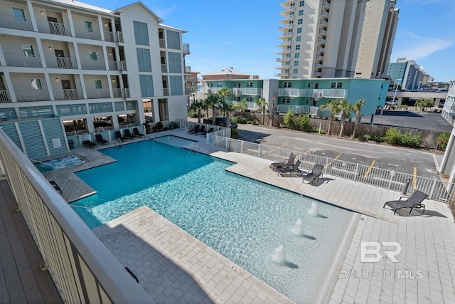 view of pool featuring a patio area