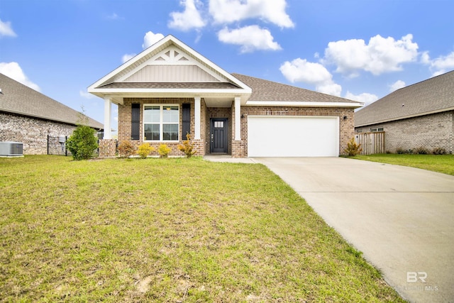 view of front of home with a front lawn, brick siding, concrete driveway, and an attached garage