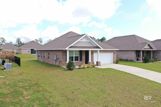 view of front facade with central AC unit, a front lawn, concrete driveway, a garage, and brick siding