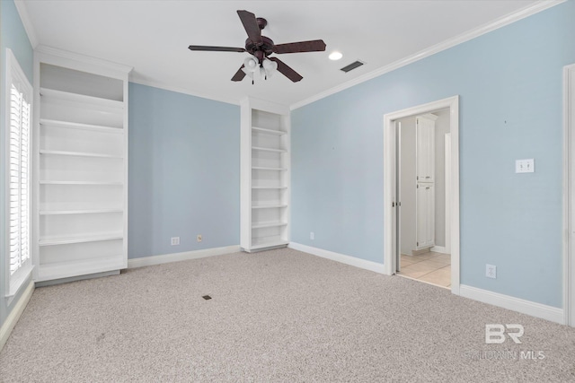 107 Fielding Pl, Mobile, AL 36608 - unfurnished bedroom with multiple windows, carpet flooring, crown molding, and baseboards