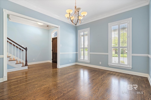 107 Fielding Pl, Mobile, AL 36608 - spare room with a chandelier, ornamental molding, stairs, wood finished floors, and baseboards