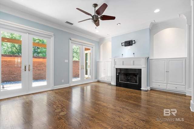 107 Fielding Pl, Mobile, AL 36608 - unfurnished living room with french doors, a ceiling fan, a fireplace, wood finished floors, and recessed lighting