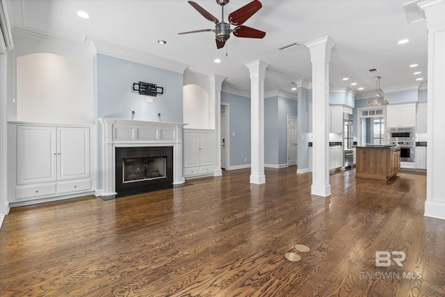 107 Fielding Pl, Mobile, AL 36608 - unfurnished living room featuring a ceiling fan, ornate columns, dark wood-style floors, a fireplace with flush hearth, and recessed lighting