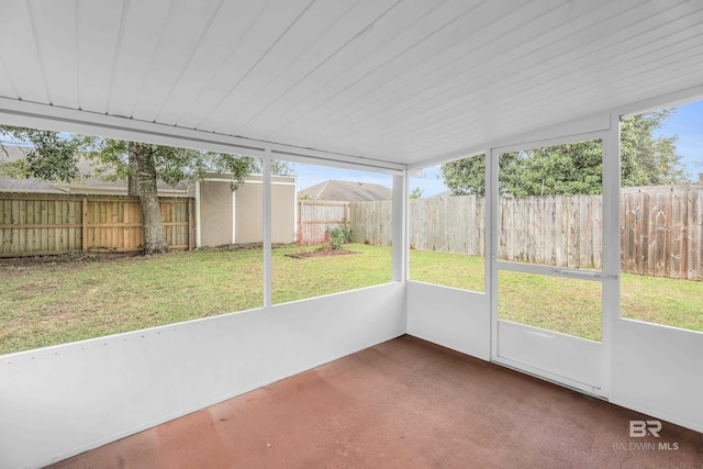 unfurnished sunroom featuring a wealth of natural light