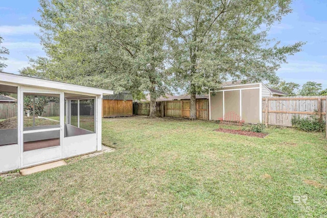 view of yard with a sunroom