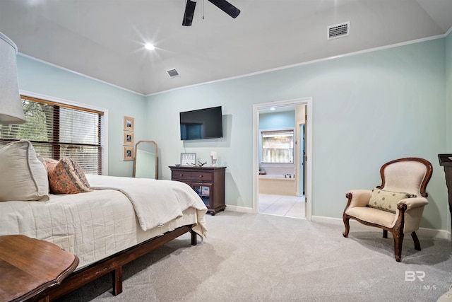 bedroom featuring baseboards, visible vents, and light colored carpet