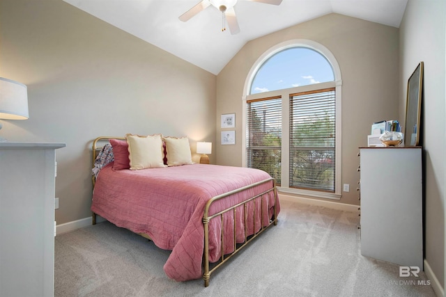 bedroom with lofted ceiling, carpet floors, a ceiling fan, and baseboards