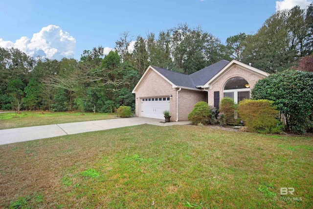 view of front of home featuring driveway, an attached garage, a front lawn, and brick siding