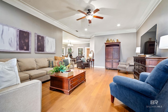 living area with light wood-type flooring, baseboards, crown molding, and ceiling fan with notable chandelier