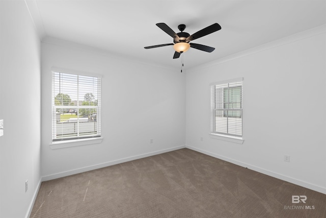 4645 Casablanca Dr, Orange Beach, AL 36561 - unfurnished room featuring plenty of natural light, carpet flooring, baseboards, and crown molding