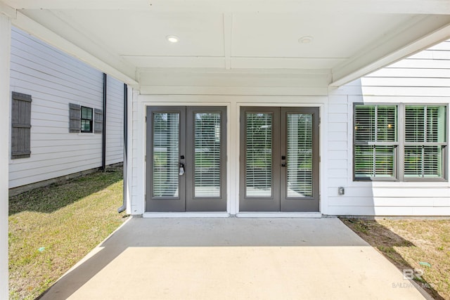 4645 Casablanca Dr, Orange Beach, AL 36561 - entrance to property featuring french doors and a lawn