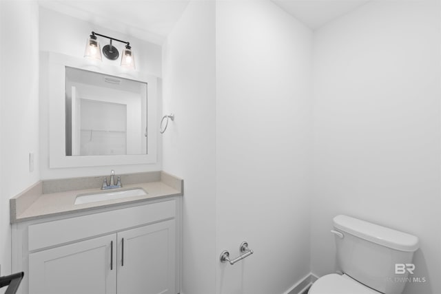 4645 Casablanca Dr, Orange Beach, AL 36561 - bathroom featuring toilet and vanity