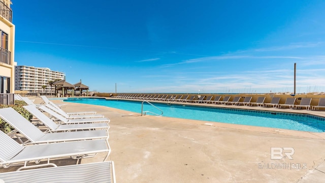 pool with a patio area