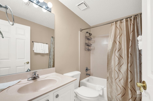 full bath with vanity, visible vents, and a textured ceiling