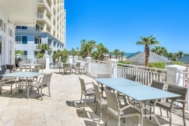 view of patio featuring outdoor dining area