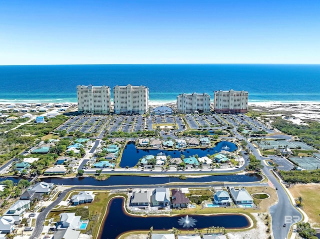 drone / aerial view with a view of city and a water view