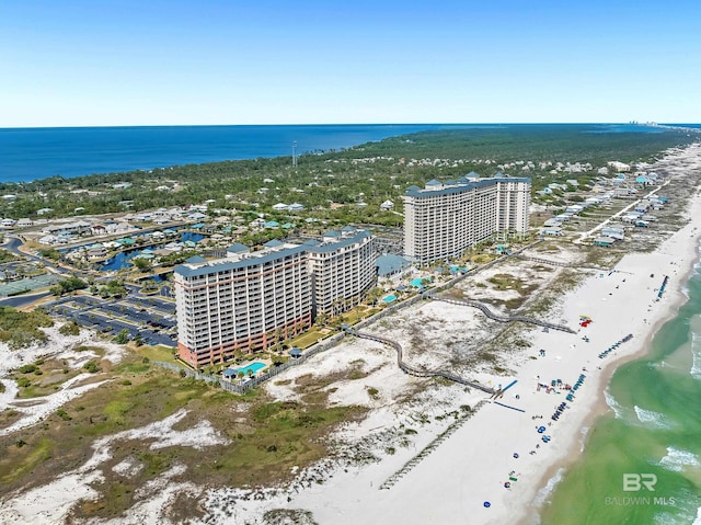 aerial view with a water view, a city view, and a beach view