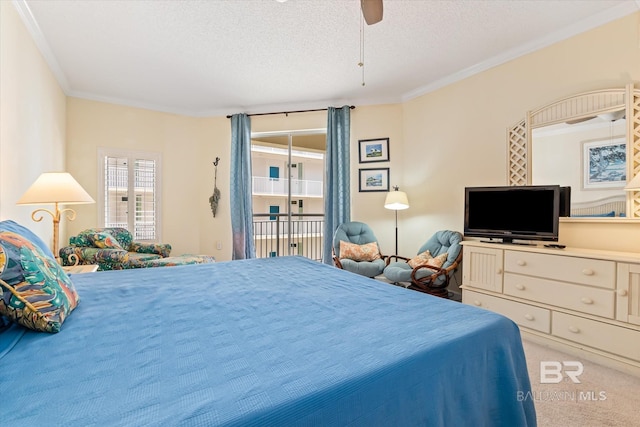 bedroom with ceiling fan, ornamental molding, access to exterior, a textured ceiling, and carpet floors